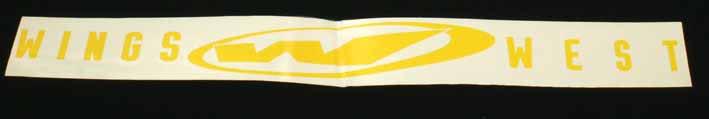 dekal framruta "Wings West" gul, 81cm