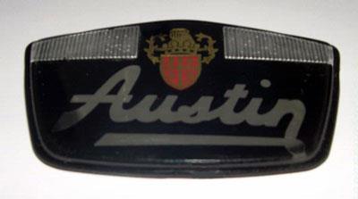 emblem fram / huv "Austin", plast