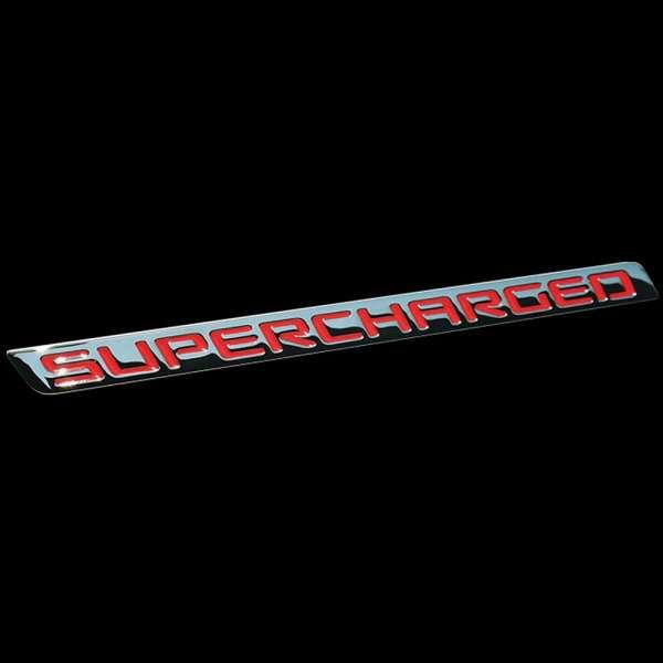 emblem "Supercharged" röd